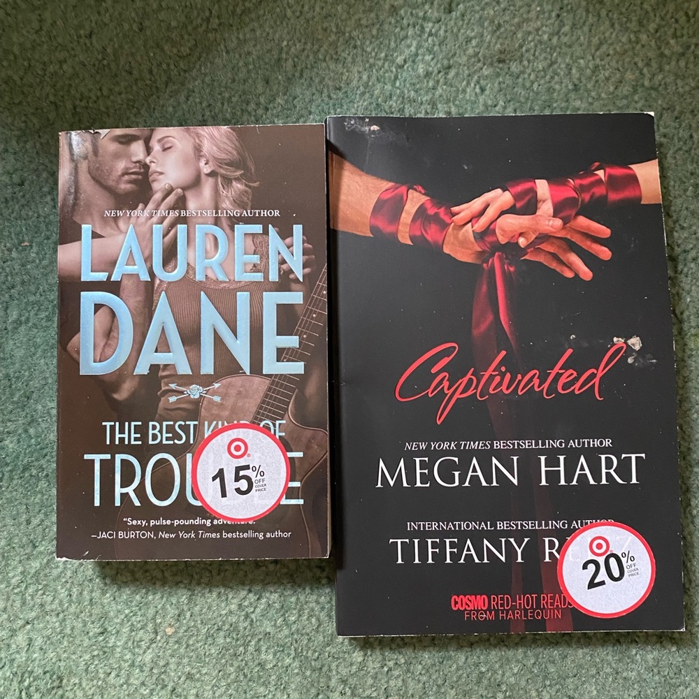Books that are romantic and spicy. New like condition.